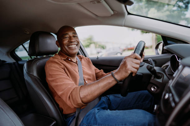Portrait of a mature male driver in the car Portrait of a mature male driver in the car